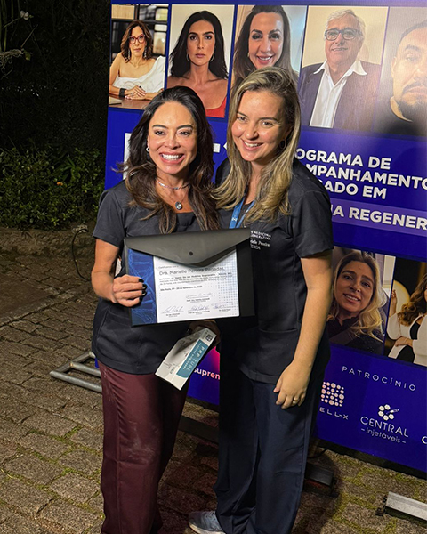 Dra. Marielle Regadas com o Dr. Lair Ribeiro em evento de medicina integrativa